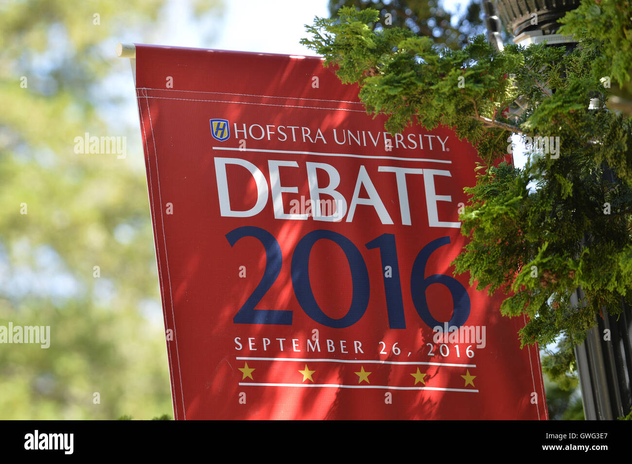 Hempstead, New York, USA. 13th Sep, 2016. Hofstra University Debate 2016 banner, in patriotic red white and blue, is one of many displayed on the campus of Hofstra University, which will host the first Presidential Debate, between H.R. Clinton and D. J. Trump, scheduled for later that month on September 26. Hofstra is first university ever selected for 3 consecutive U.S. presidential debates. © Ann Parry/ZUMA Wire/Alamy Live News Stock Photo
