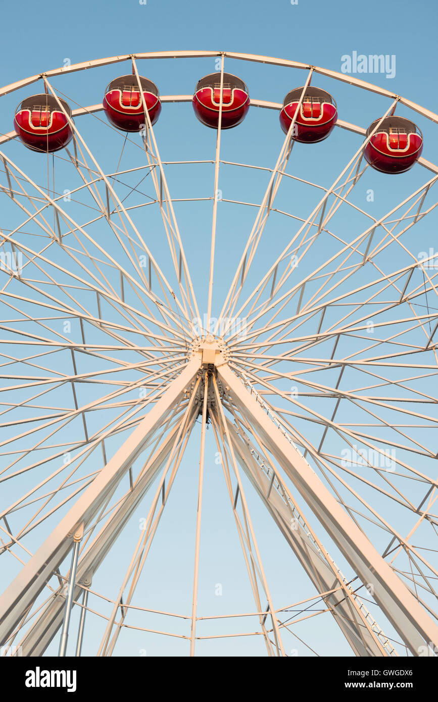 Ferris wheel on blue sky during sunset Stock Photo - Alamy