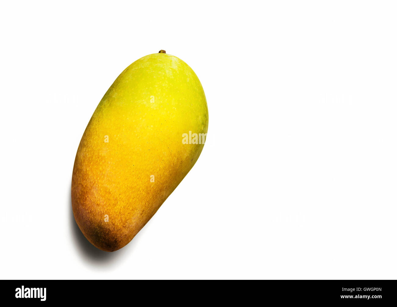 Ripe mangoes on a white background Stock Photo - Alamy