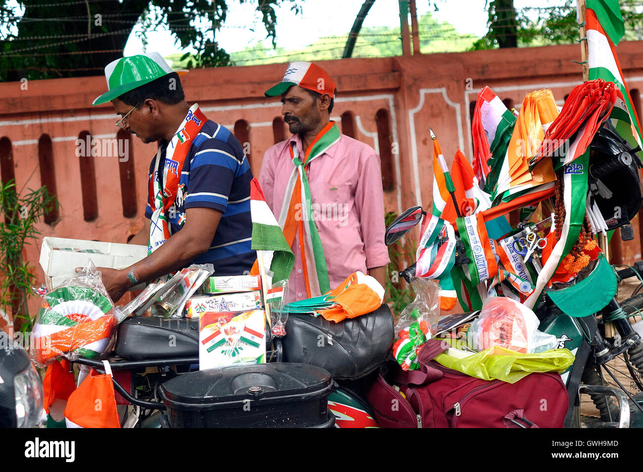 Vendor selling  Indian Flag at market Stock Photo