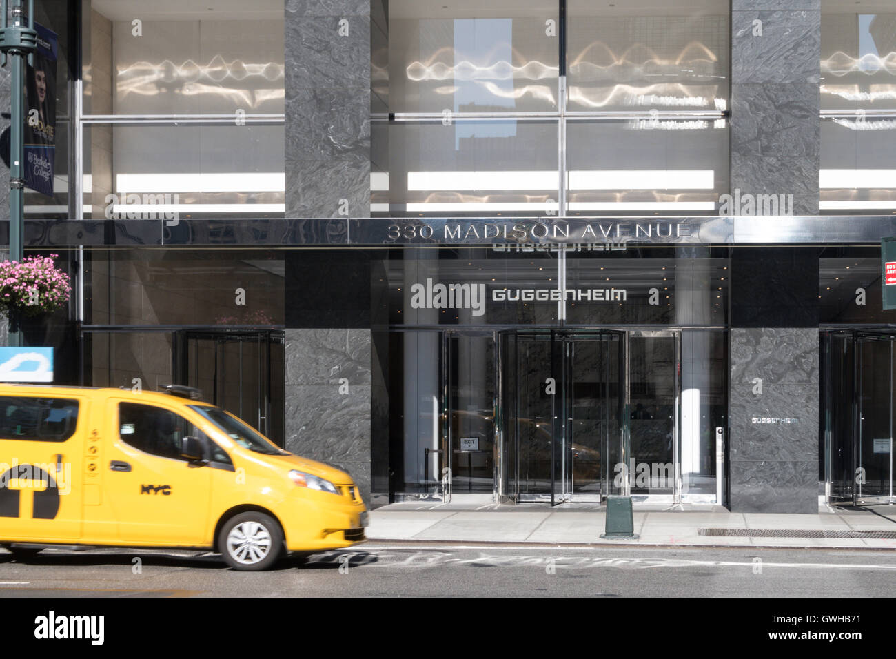 Taxi in Front of Main Entrance to 330 Madison  Avenue, NYC, USA Stock Photo
