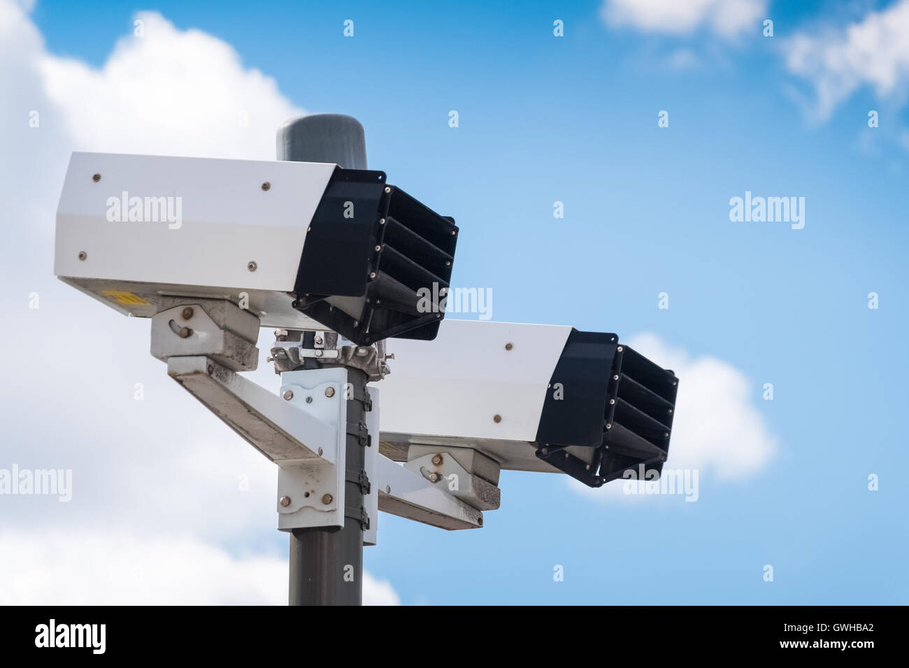 Modern speed camera with sky on the background Stock Photo - Alamy