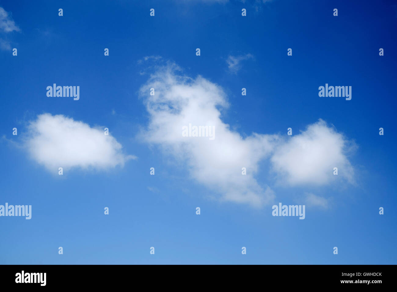 Blue sky with Cumulus clouds looking up Stock Photo