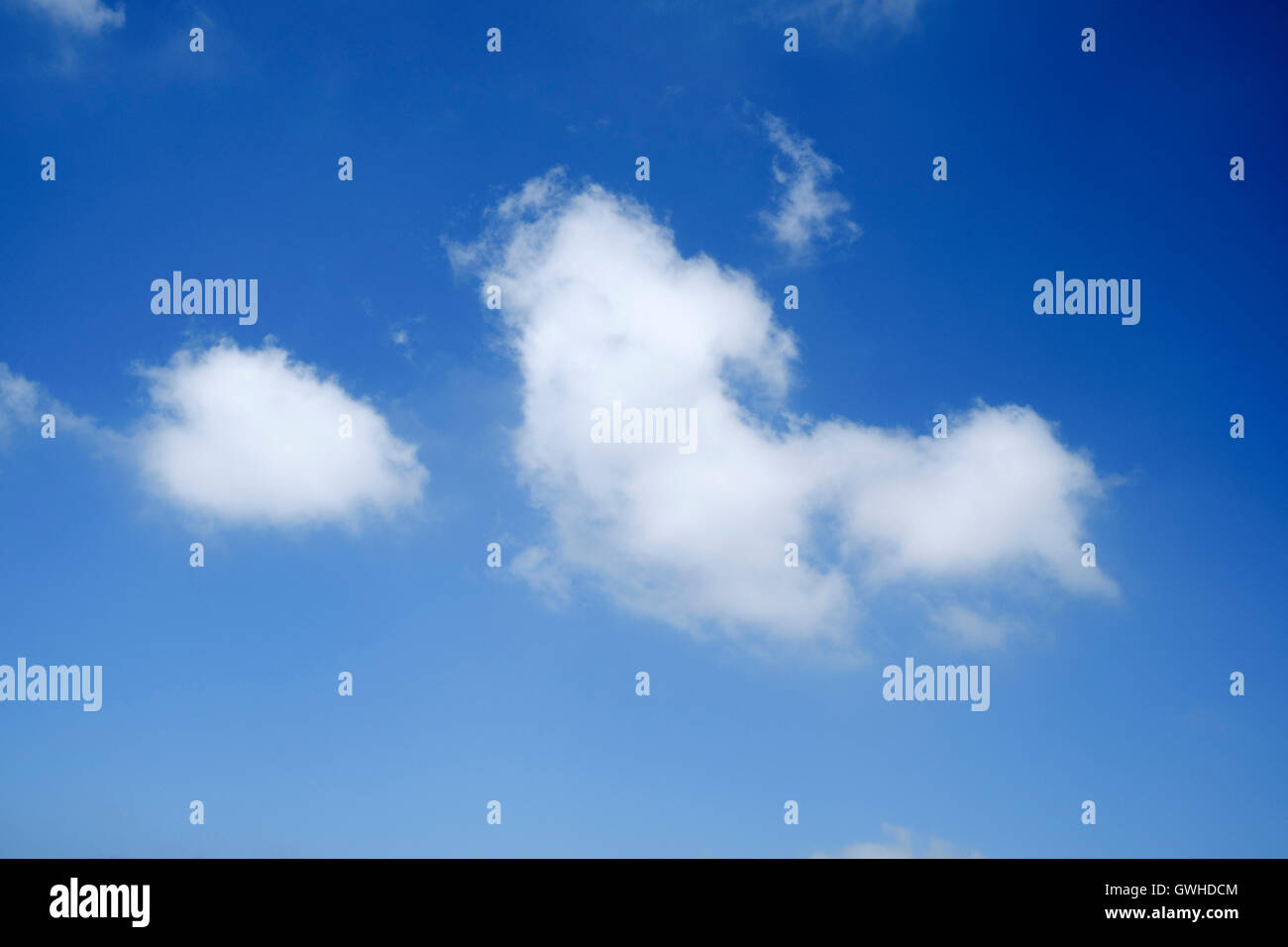 Blue sky with Cumulus clouds - looking up Stock Photo