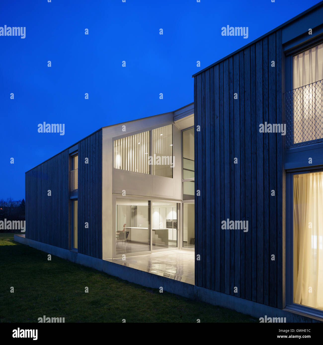 Exterior of a modern house, night scene Stock Photo Alamy