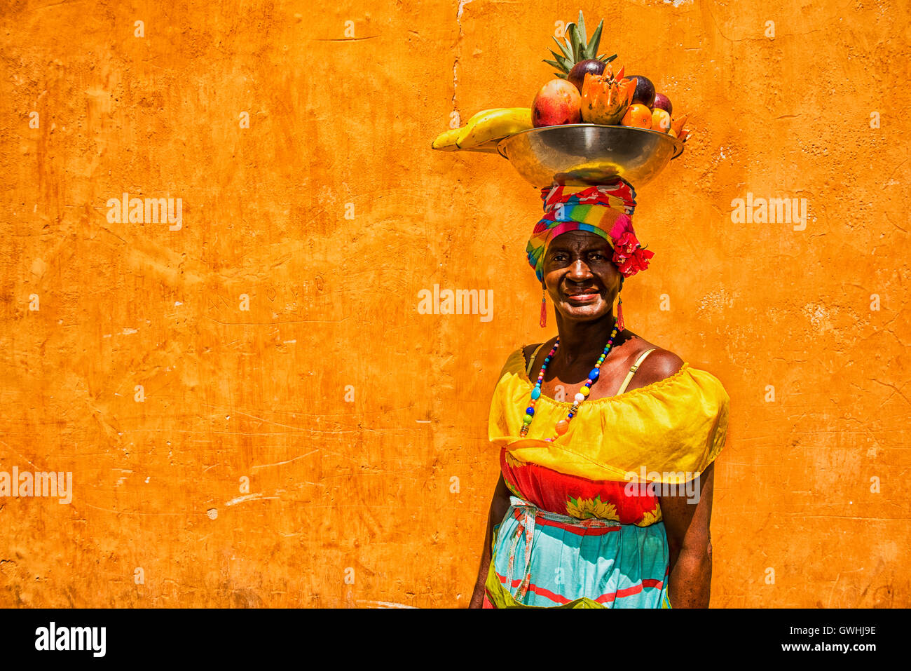 Cartagena de Indias, Colombia - February 23, 2014: Colombian woman wearing traditional clothes in Cartegena de Indias Stock Photo