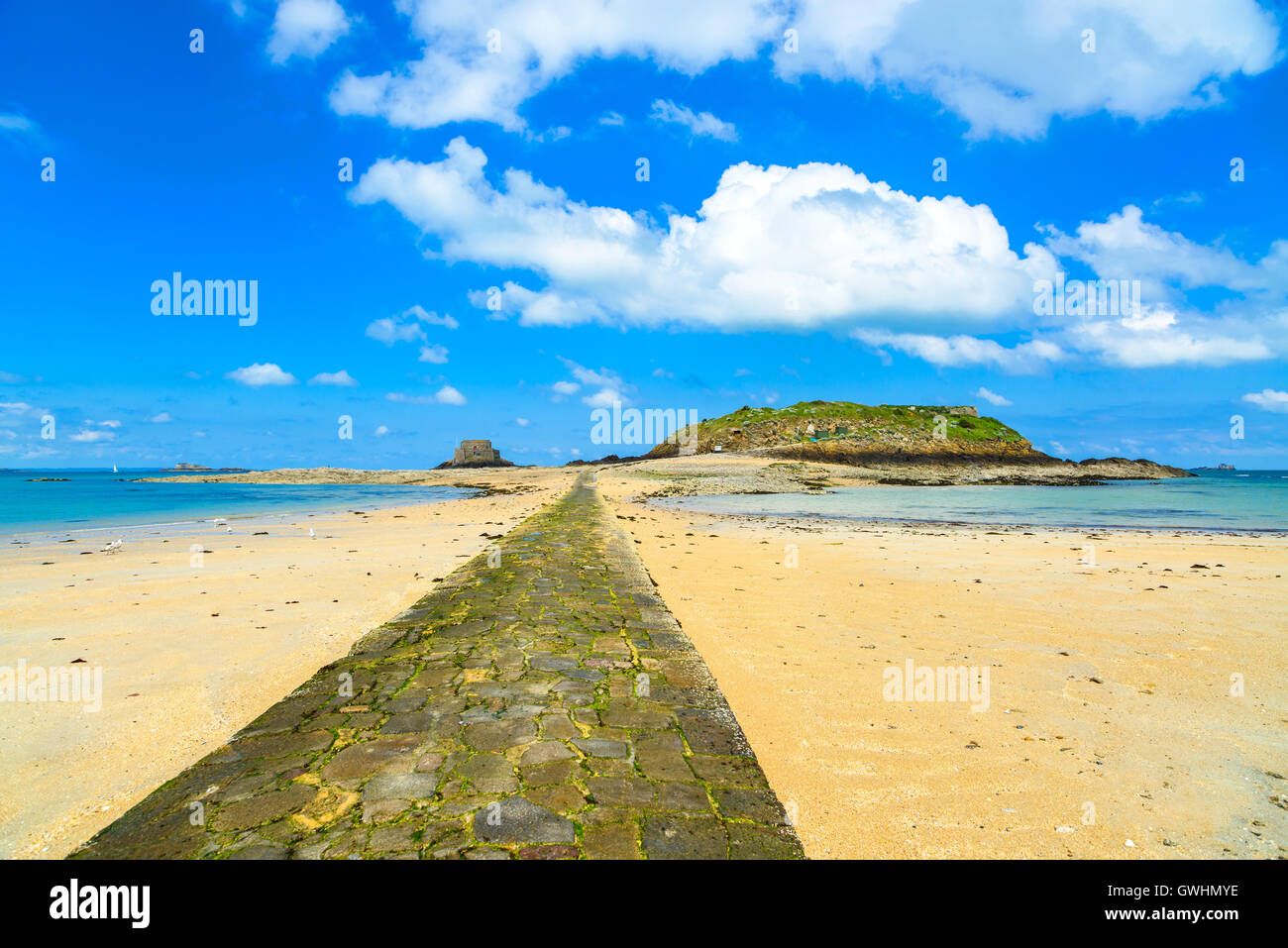 Saint Malo bay, stone pathway, Grand and Petit Be Fort during Low Tide. Brittany, France, Europe. Stock Photo
