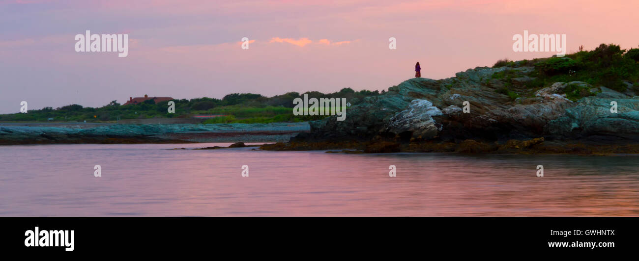 Sunset on a rocky shore Stock Photo - Alamy