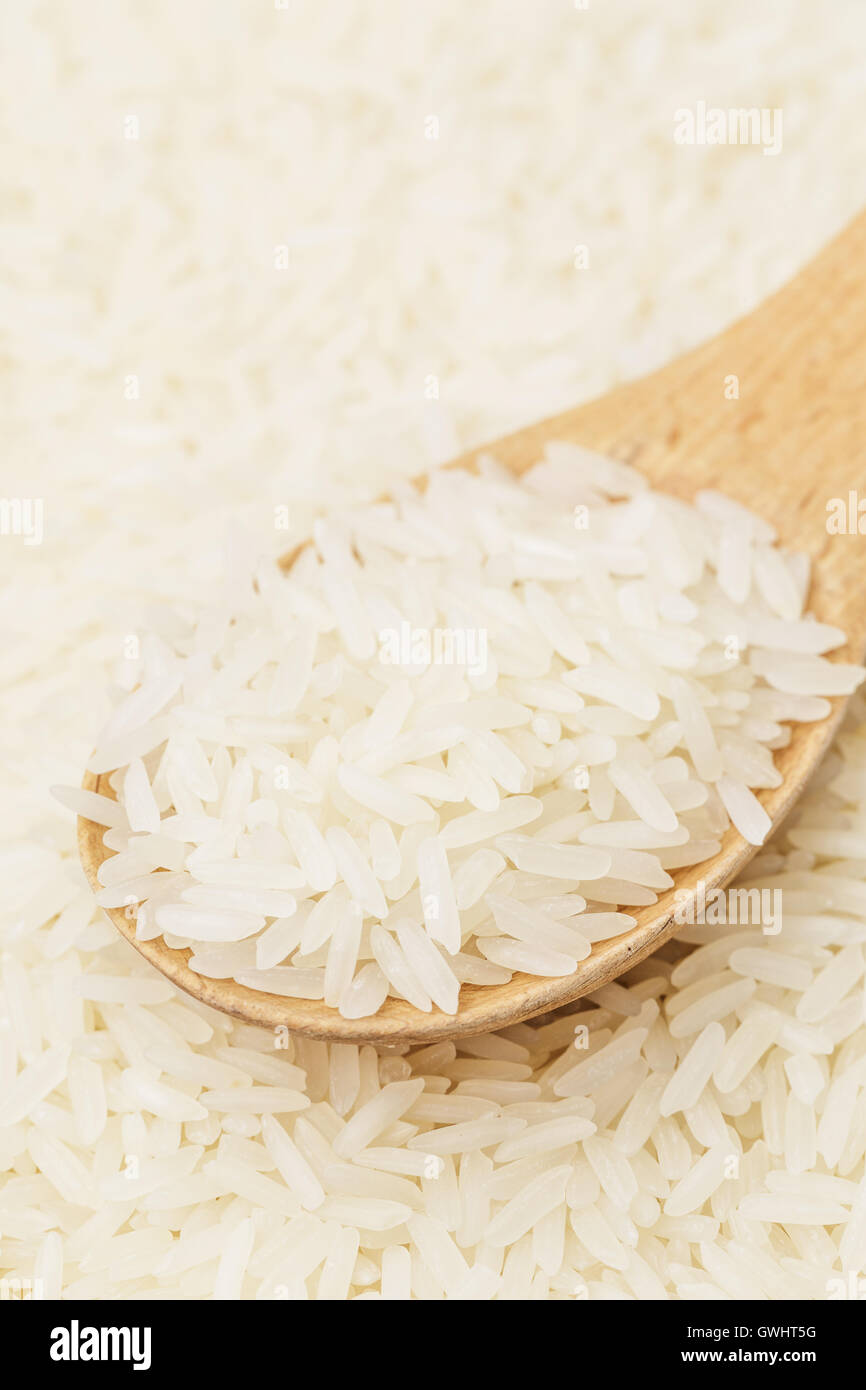 White rice on teaspoon Stock Photo Alamy