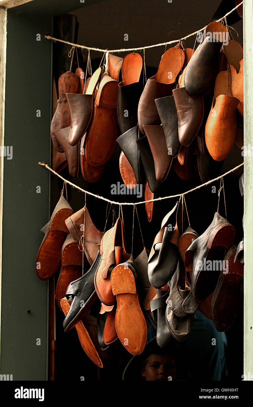 Shoes display at shoemaker shop in Colonial Williamsburg, Virginia, USA Stock Photo