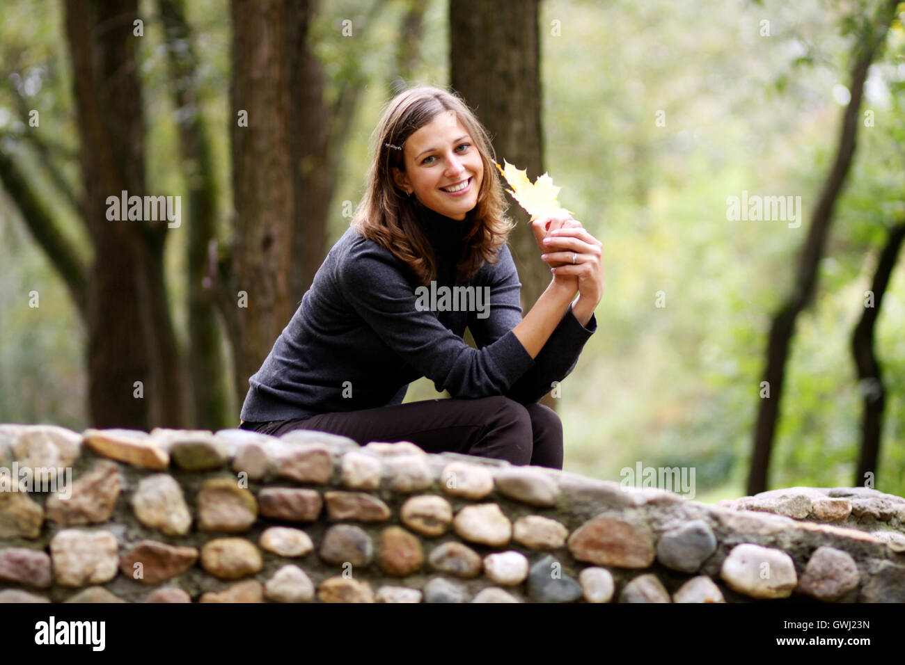 Closeup portrait of a happy young woman smiling Stock Photo - Alamy