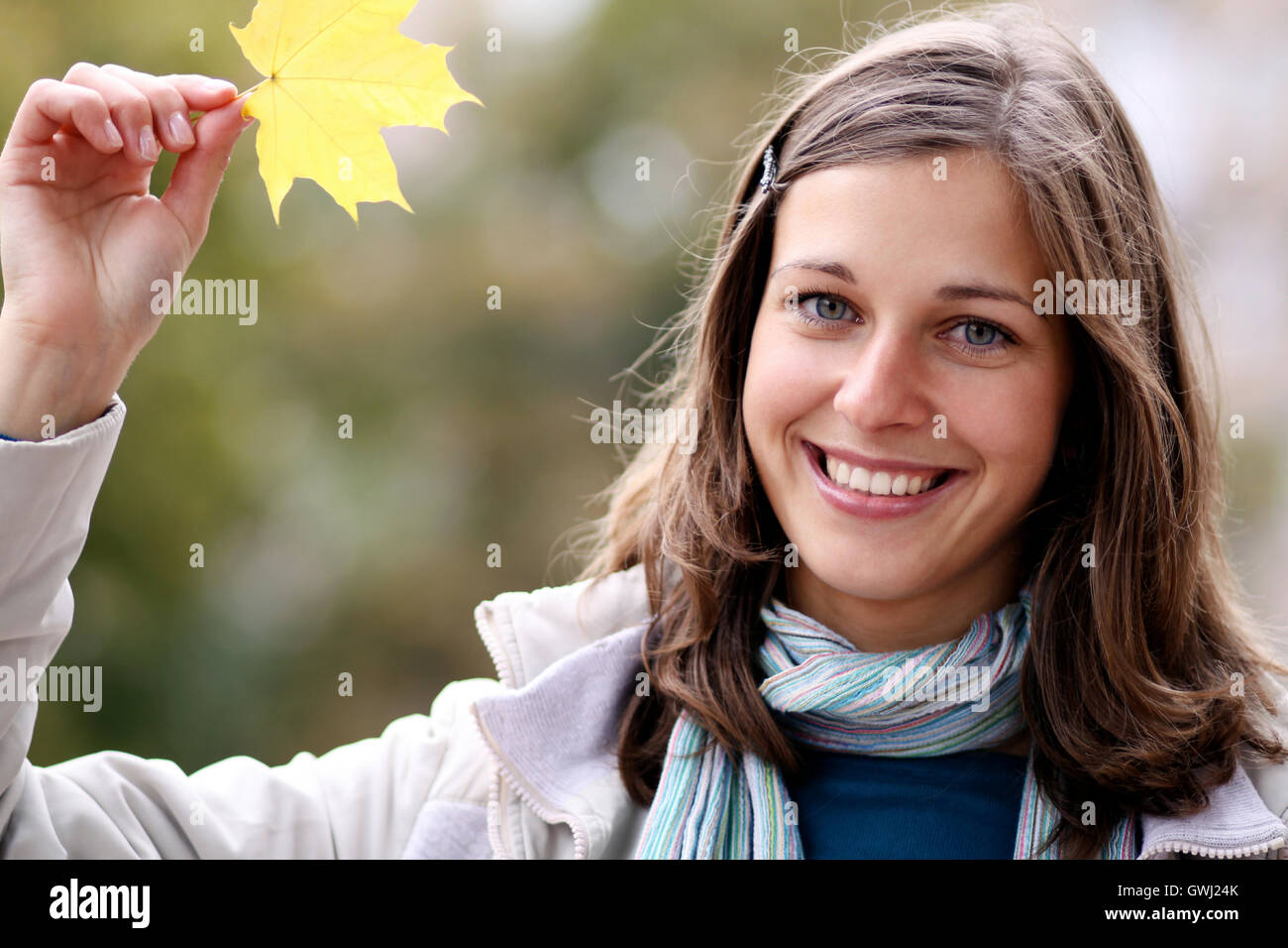 Closeup portrait of a happy young woman smiling Stock Photo - Alamy