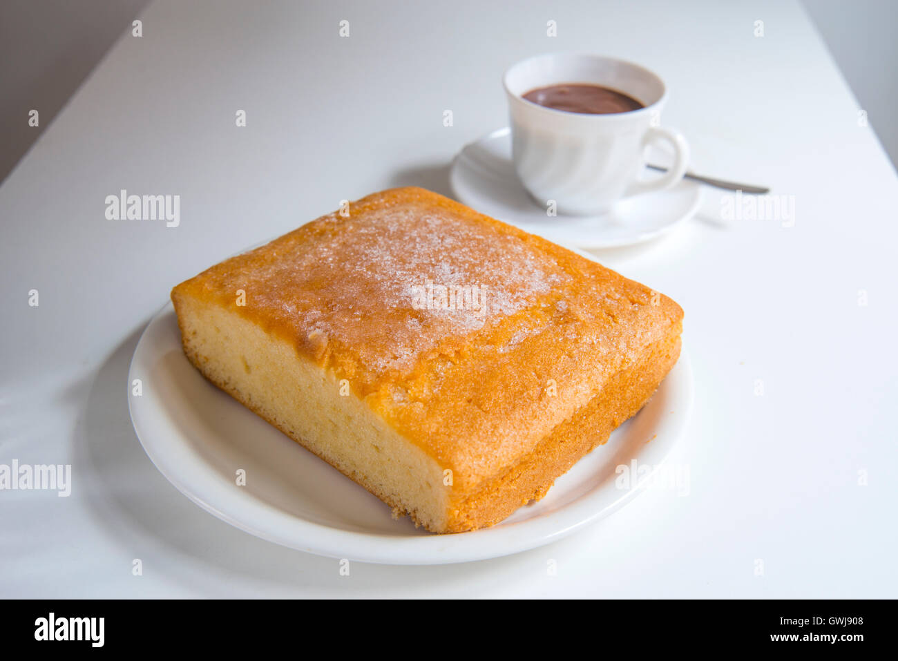 Cake and cup of chocolate for breakfast. Stock Photo