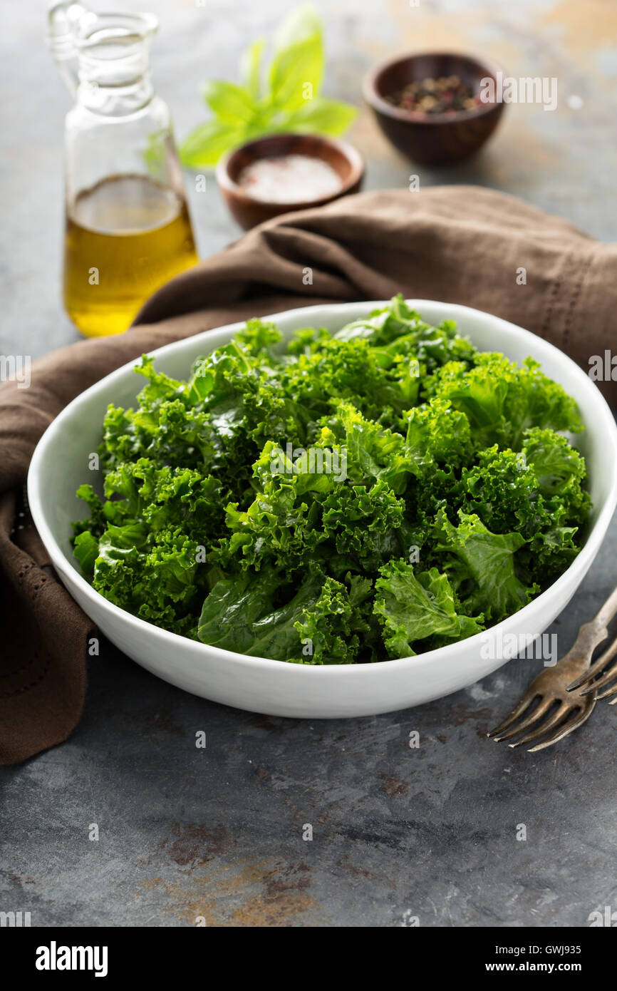 Fresh kale with olive oil, salt and pepper Stock Photo Alamy