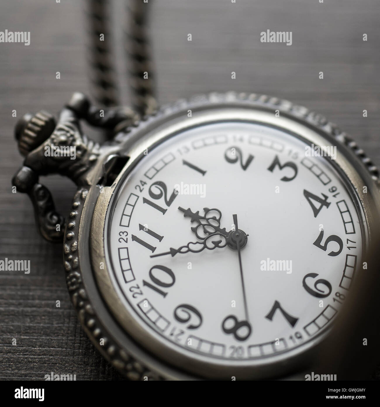 Old pocket watch  in close up. Vintage still life. Stock Photo