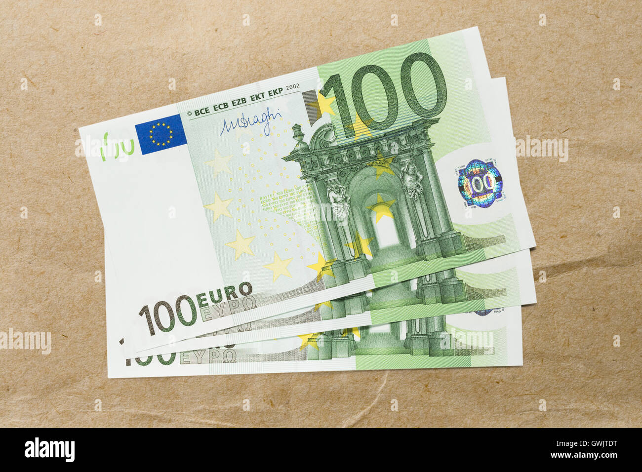 One hundred euro banknotes on paper background Stock Photo