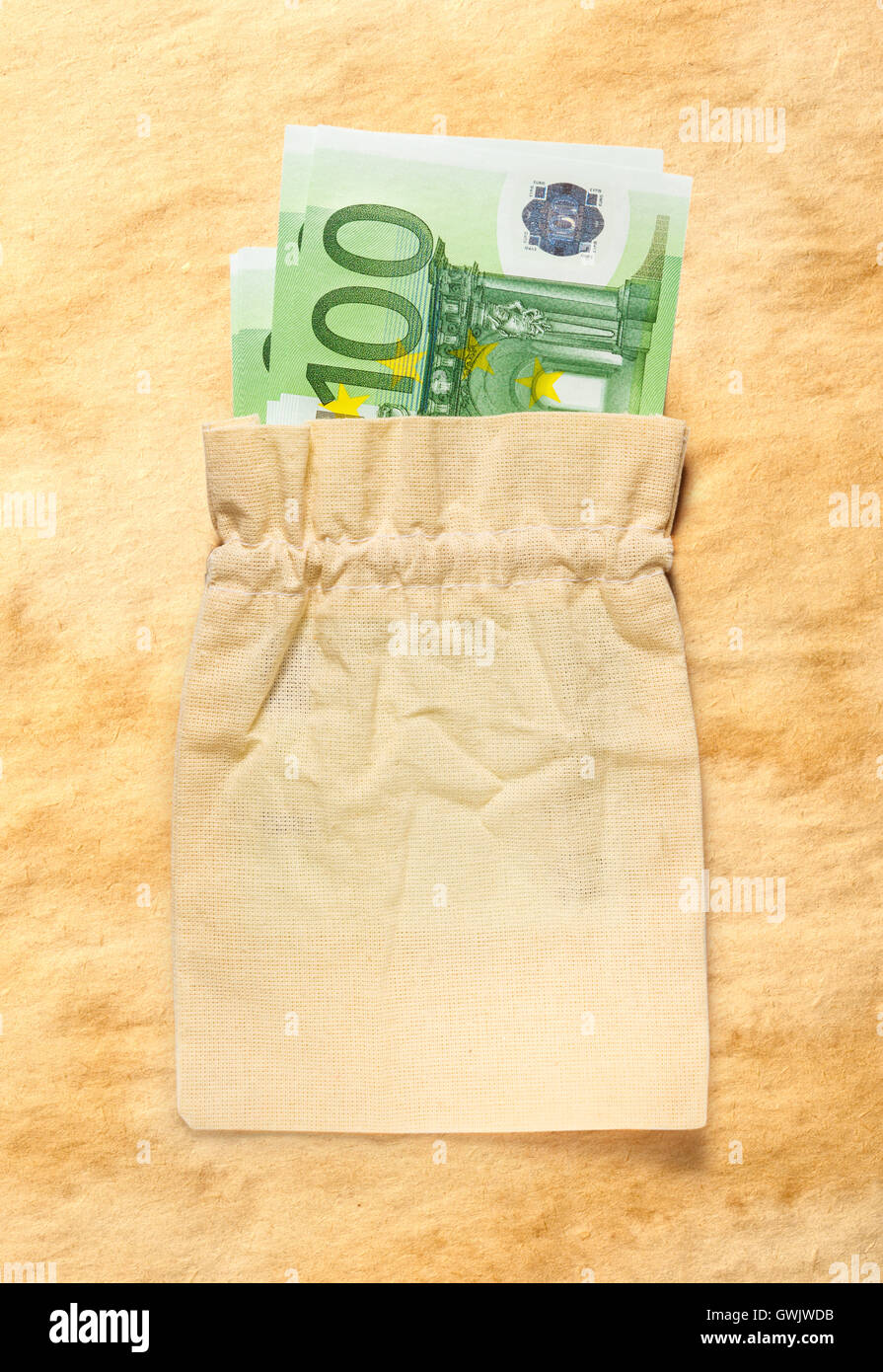 One hundred euro banknotes in linen sack closeup Stock Photo - Alamy