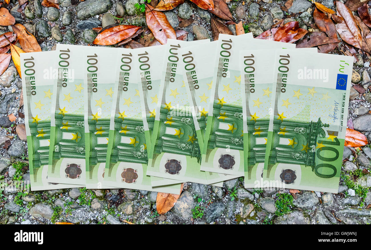 One hundred euro banknotes on stone background Stock Photo - Alamy