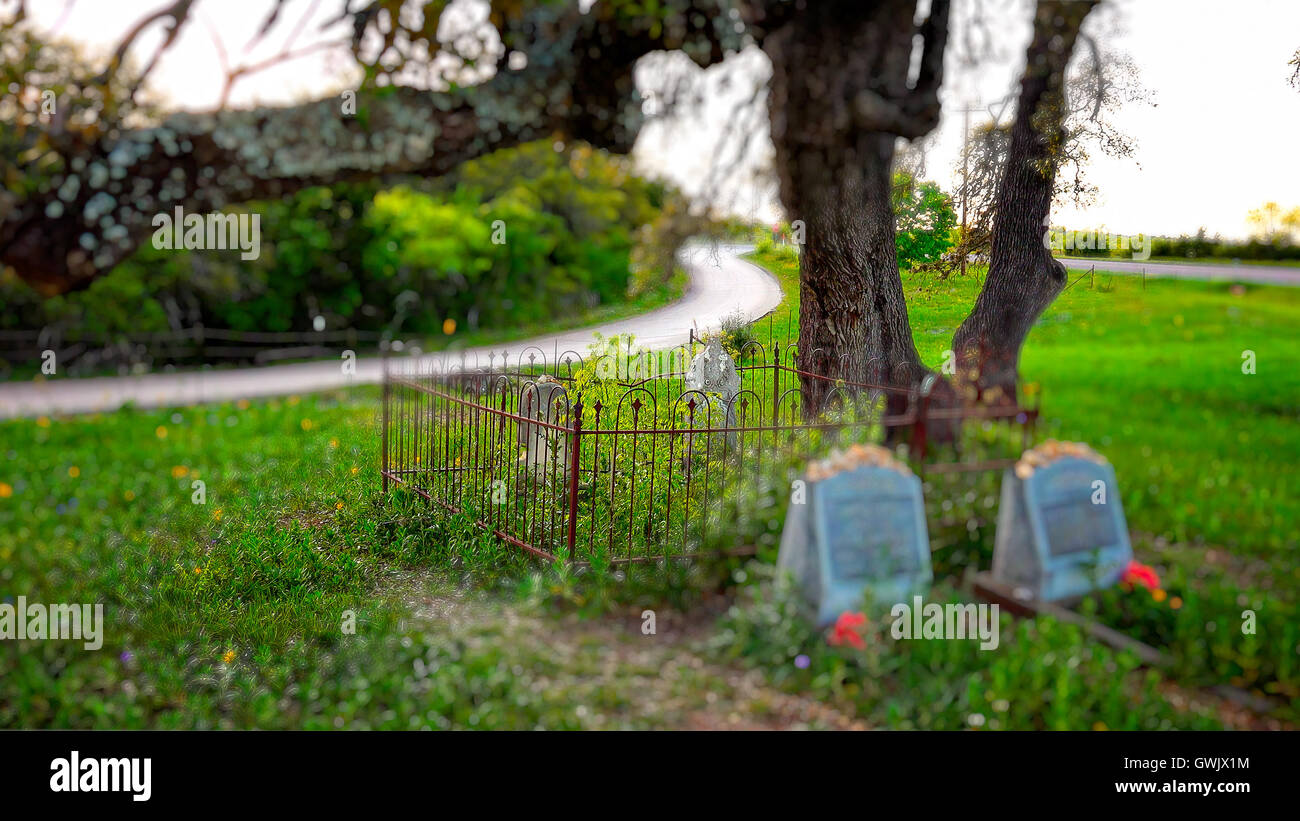 Tiny cemetery sits under an old oak tree in the famous Texas Hill Country near fredericksburg Stock Photo