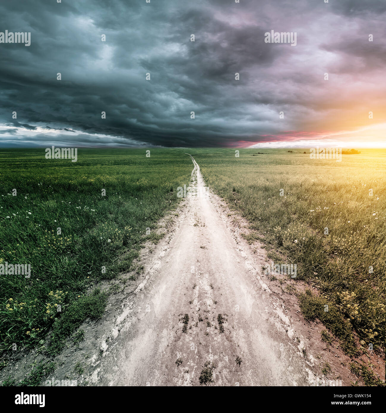 Dark stormy clouds above the road Stock Photo - Alamy