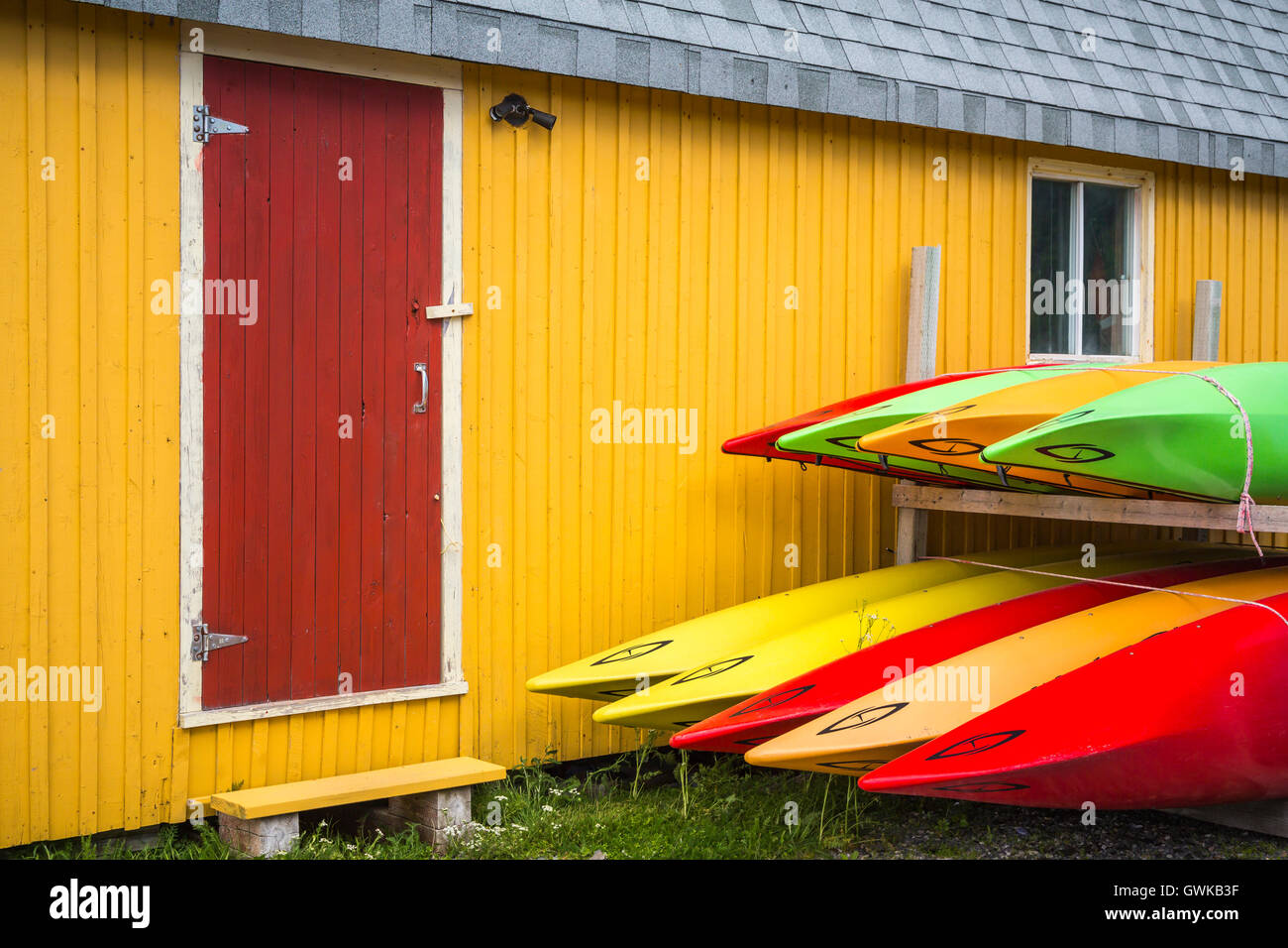 Colorful kayaks and fishing stages at Norris Point, Gros Morne National Park, Newfoundland and Labrador, Canada. Stock Photo