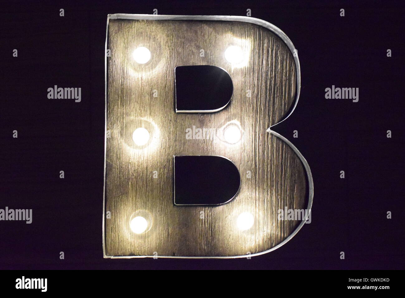 An illuminated letter B with black background Stock Photo