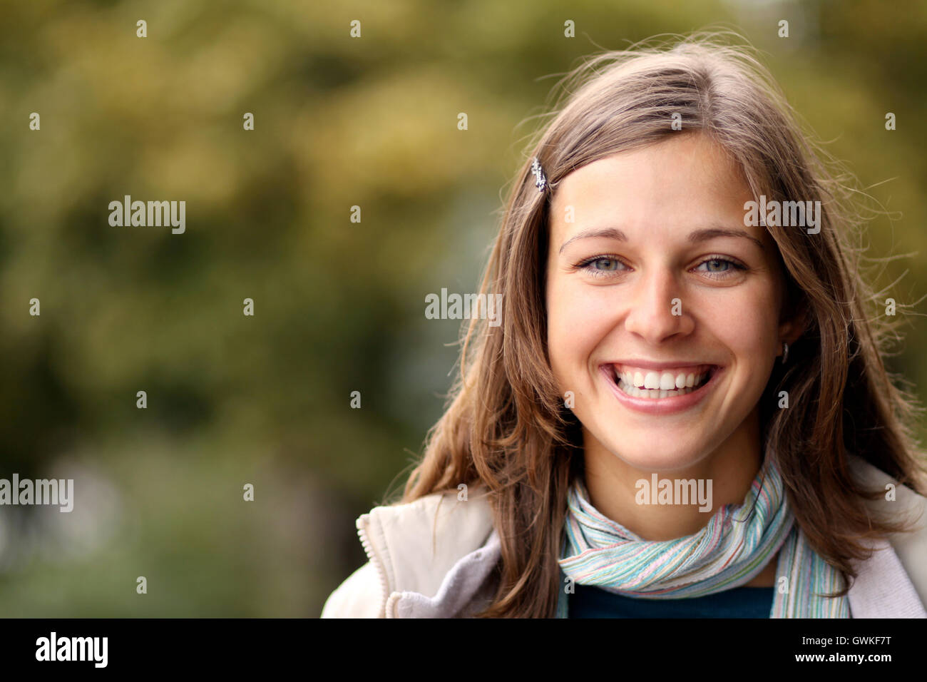 Closeup portrait of a happy young woman smiling Stock Photo - Alamy