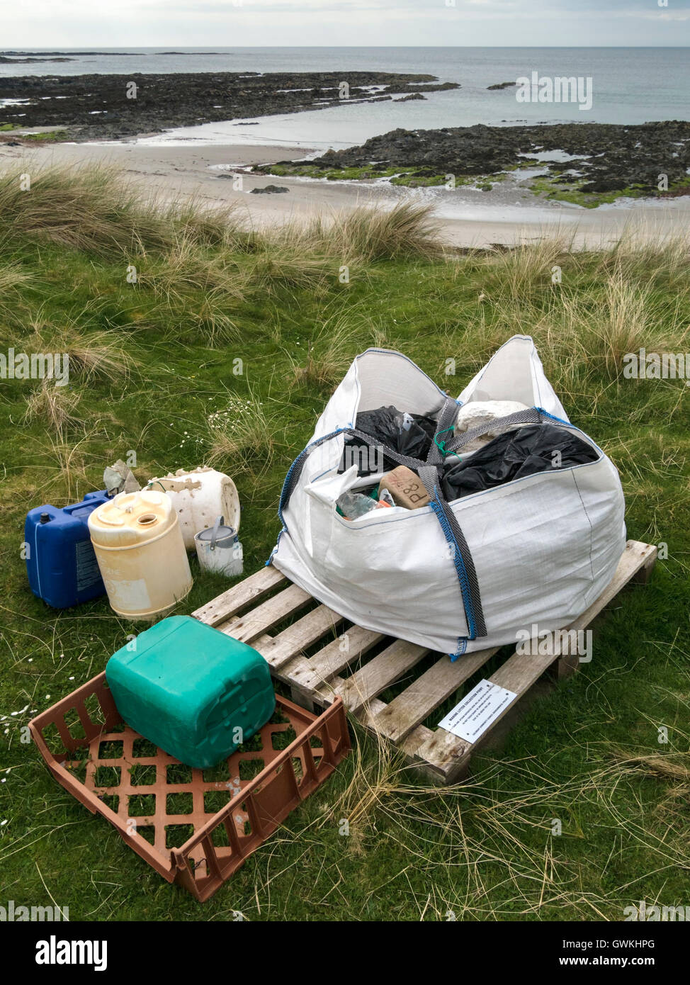 Marine litter collection point by beach, Plaide Mhor, Ardskenish, Isle of Colonsay, Scotland, UK. Stock Photo