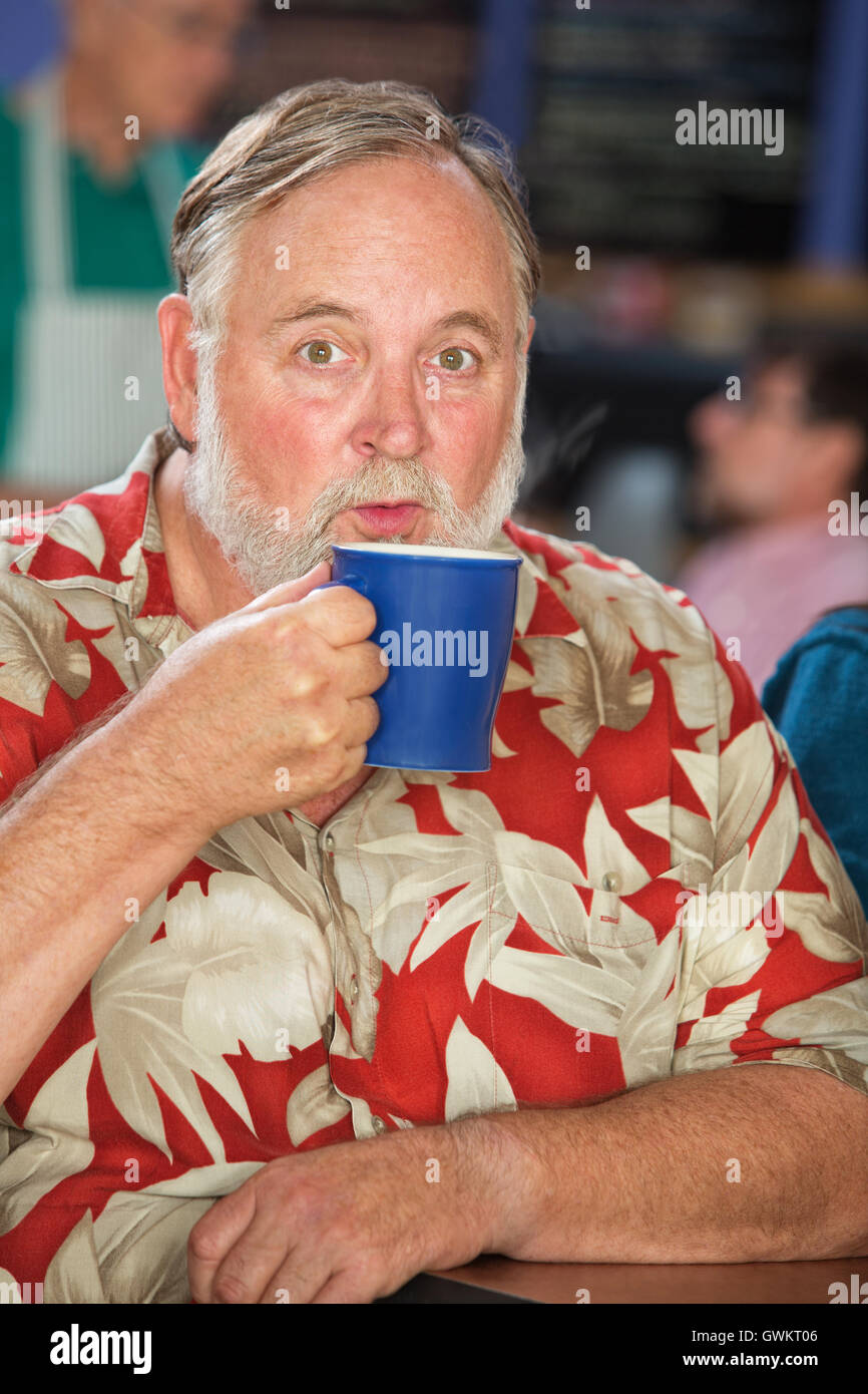 Man beard blowing on hi-res stock photography and images - Alamy