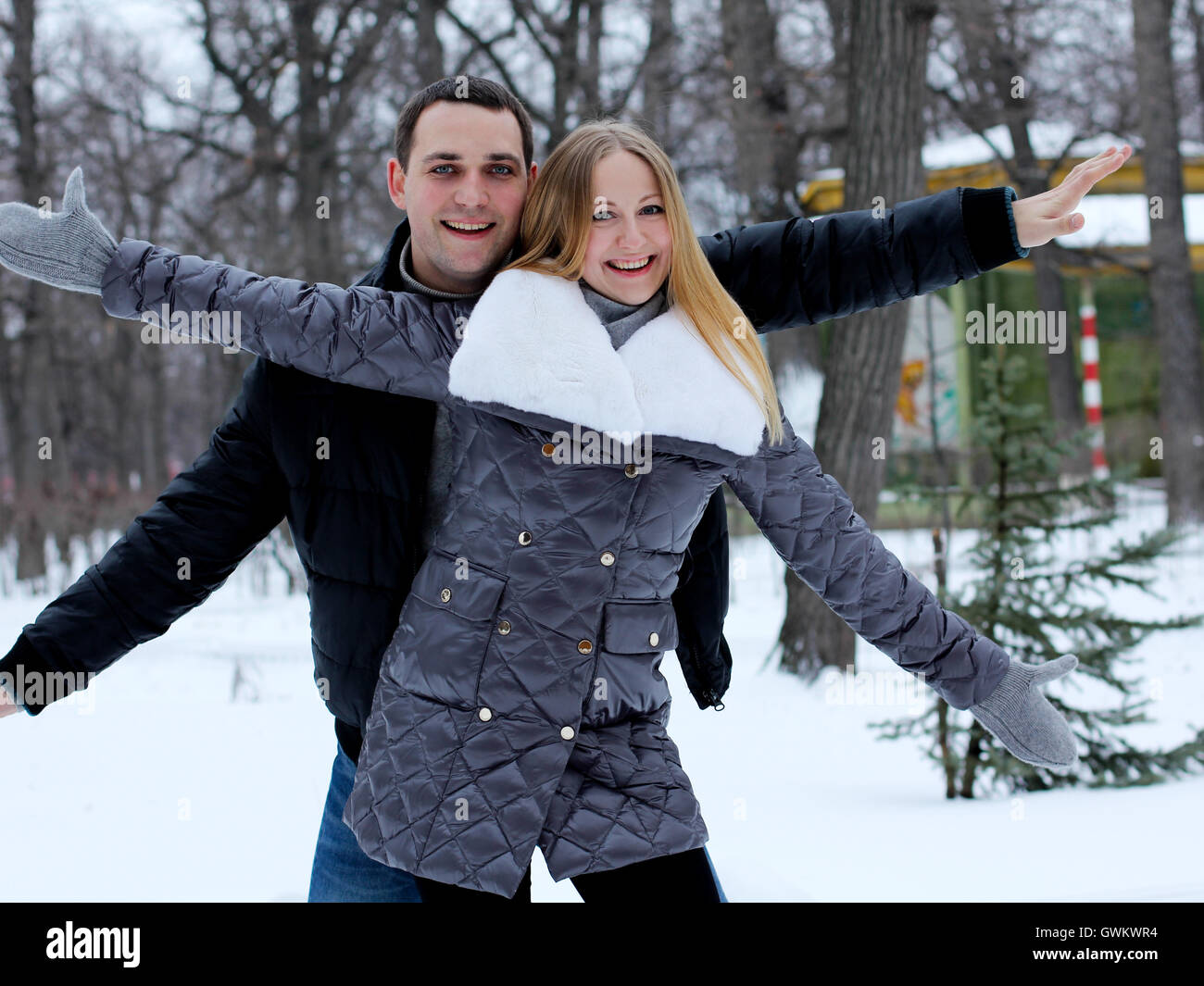 Portrait of a happy young couple Stock Photo - Alamy