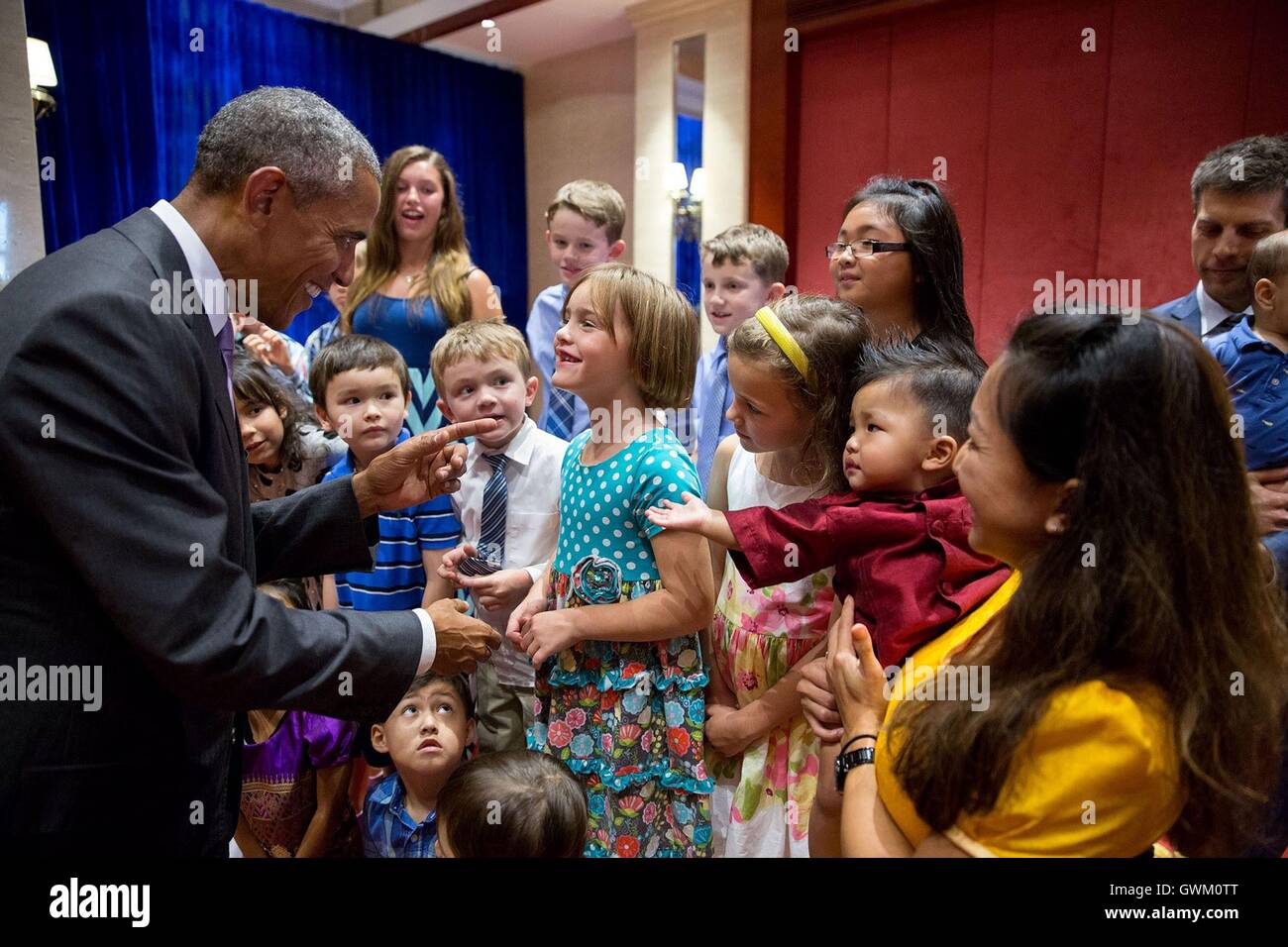 U.S President Barack Obama greets children of the U.S. Embassy staff September 6, 2016 in Vientiane, Laos. Obama is in Laos for the ASEAN Summit. Stock Photo