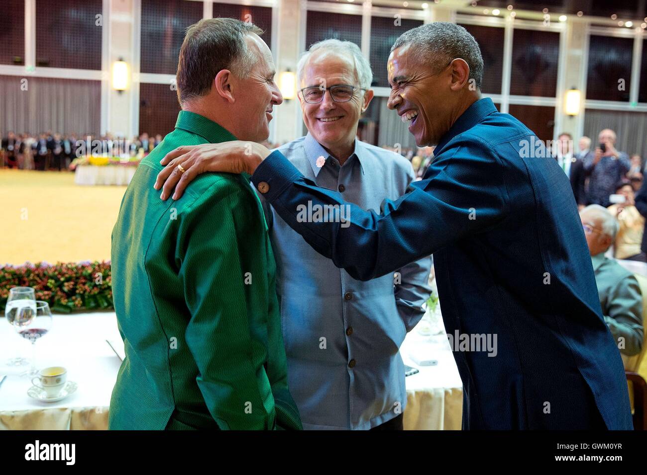 U.S. President Barack Obama talks with New Zealand Prime Minister John Key and Prime Minister of Australia Malcolm Turnbull during the ASEAN gala dinner at the National Convention Centre September 2016 in Vientiane, Laos. Stock Photo