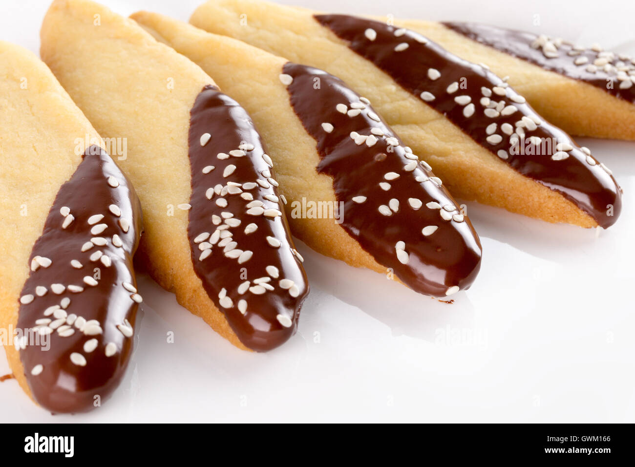 biscuits with chocolate glaze isolated on the white background. Stock Photo