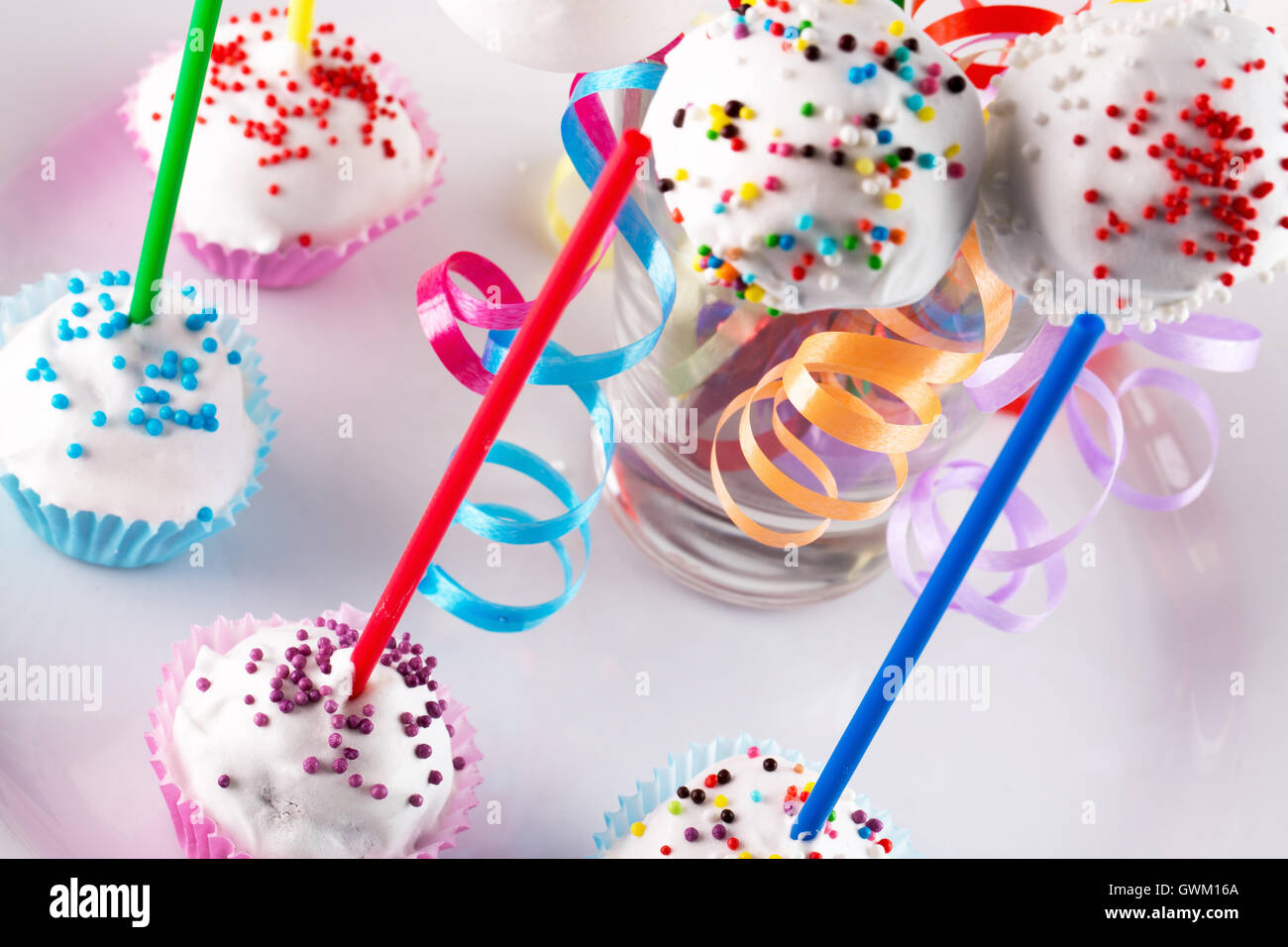pop candies on white plate. Stock Photo
