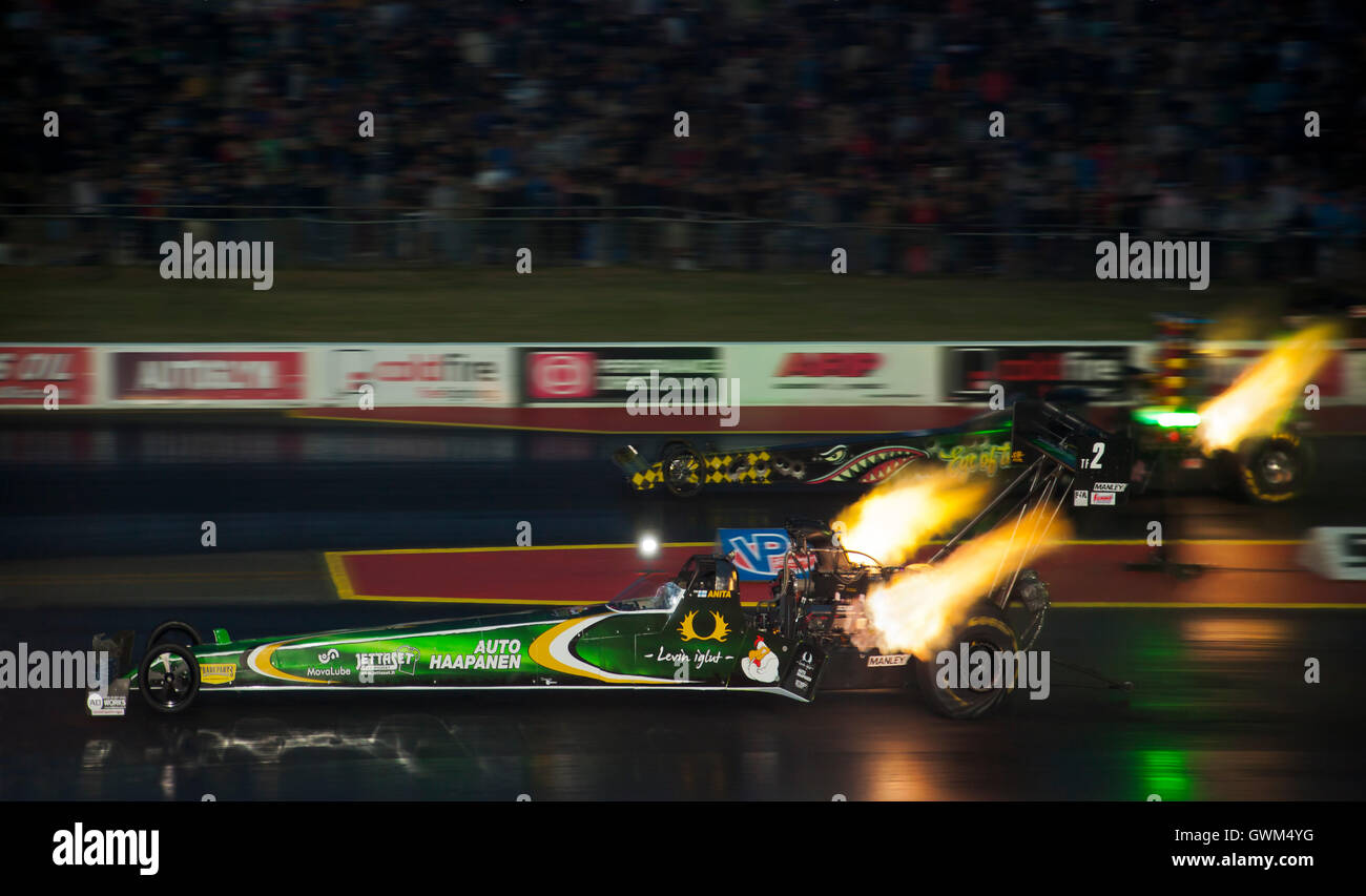 Top Fuel Drag racing at Santa Pod. Anita Mäkelä nearside V Stig Neergaard far side. Stock Photo