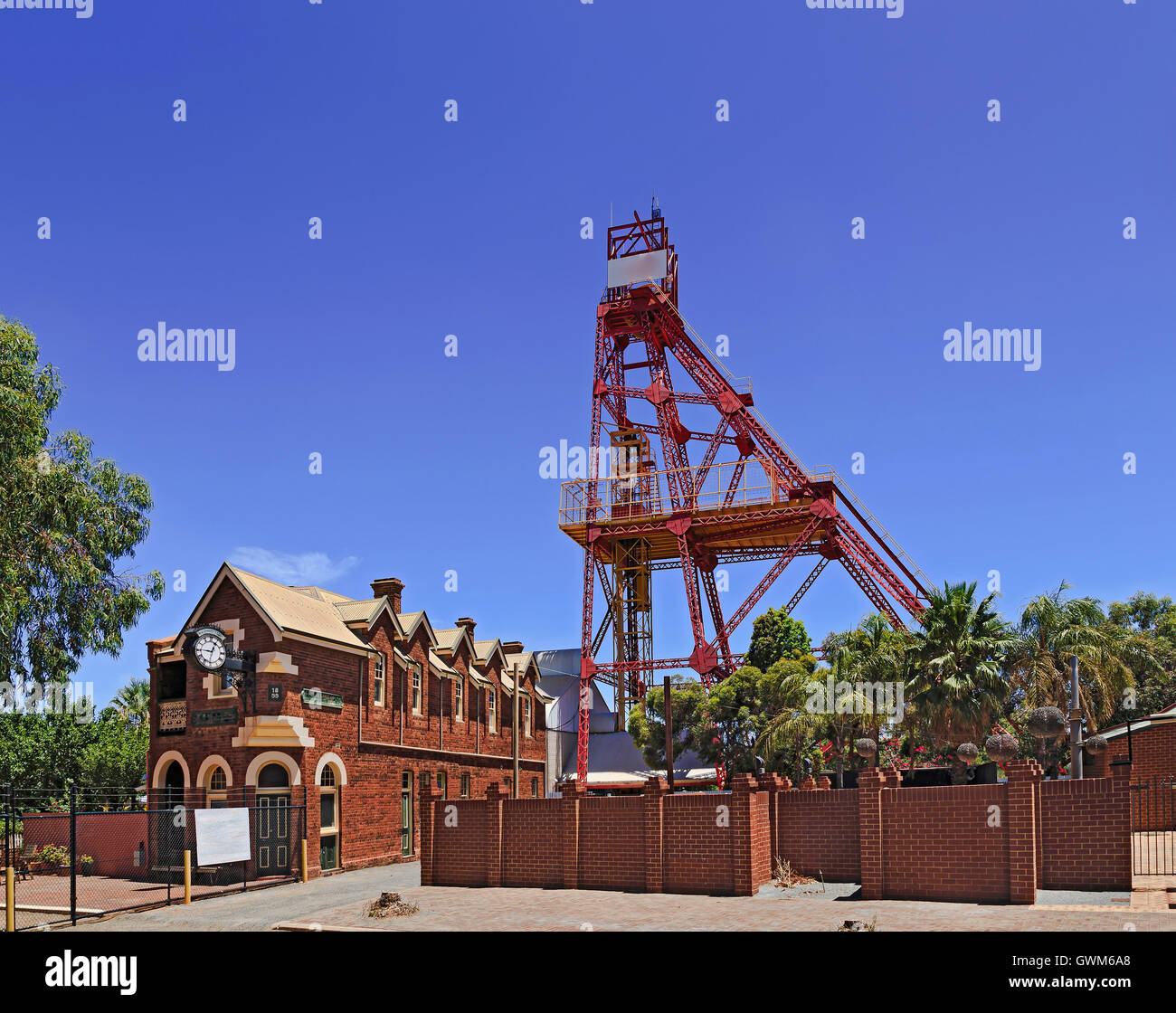 Historic building and industrial mining machinery tower in Kalgoorlie