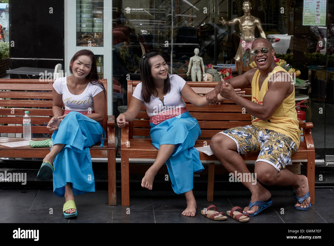 African Man Amusing The Girls At A Thai Massage Parlor Thailand S E 