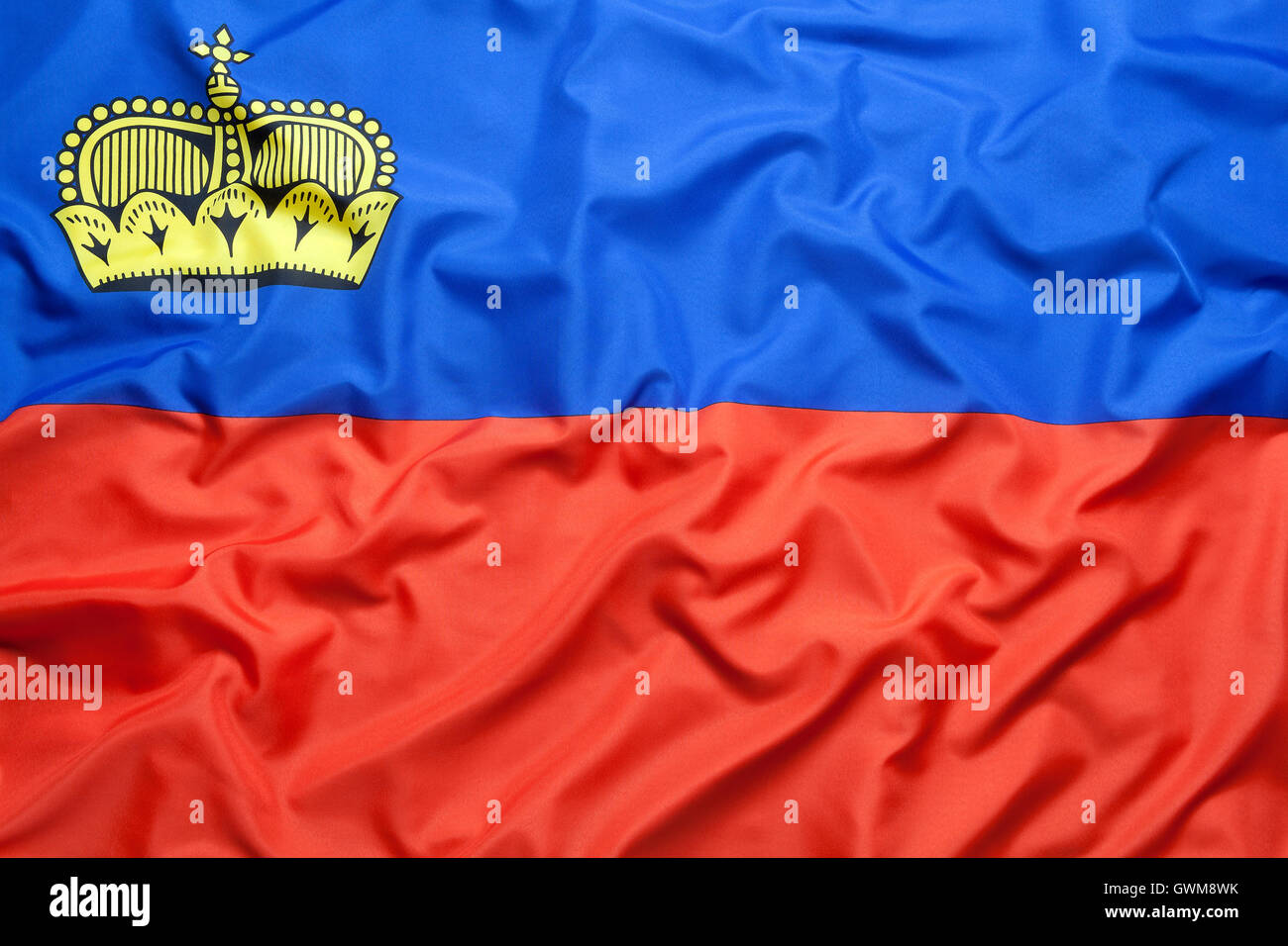 Textile flag of Liechtenstein for a background Stock Photo