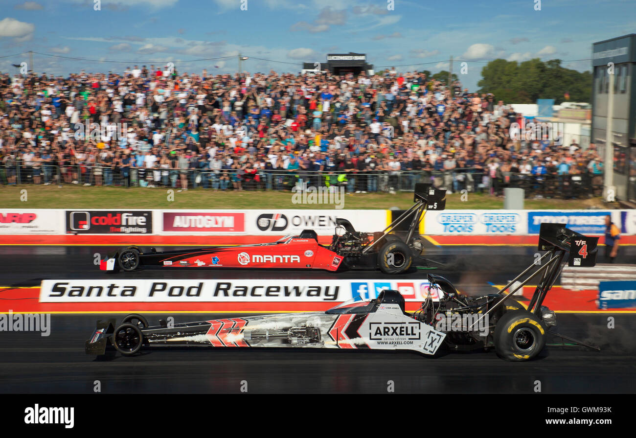 Top Fuel drag racing at Santa Pod.  Liam Jones nearside V Duncan Micallef far side. Stock Photo