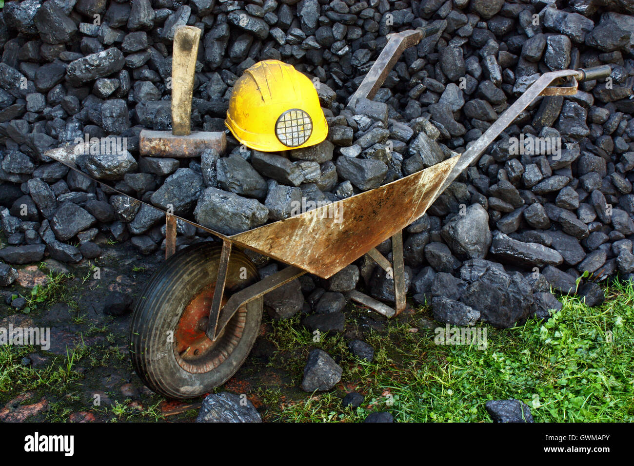 Mining tools on a background of coal Stock Photo - Alamy