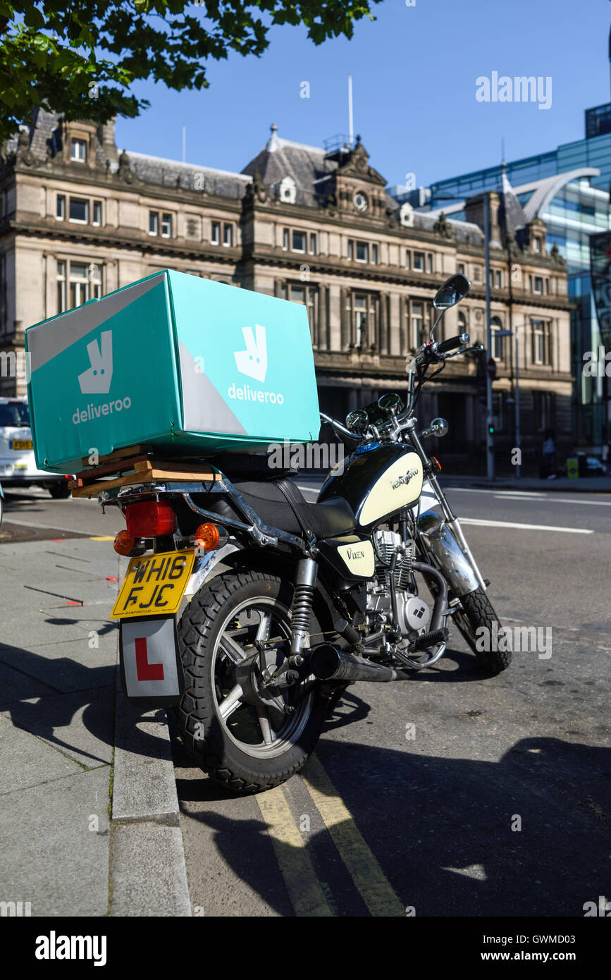 Deliveroo Food Courier Delivery Services. Stock Photo
