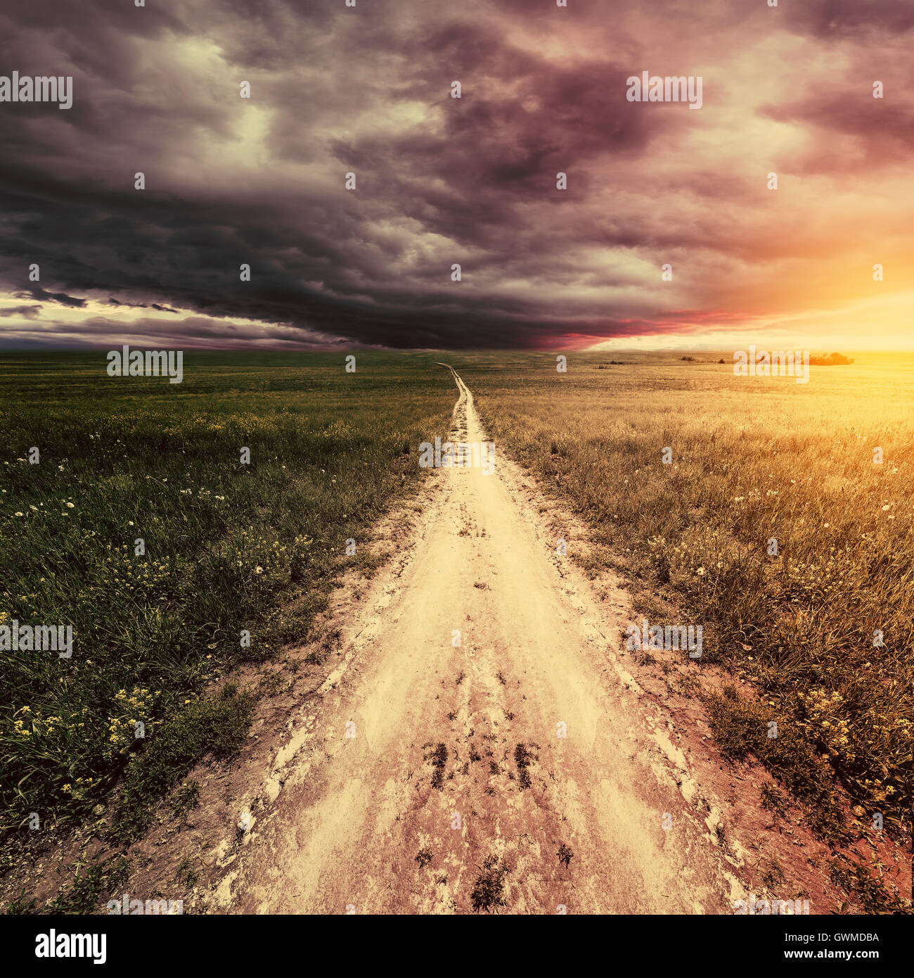 Dark stormy clouds above the road Stock Photo - Alamy