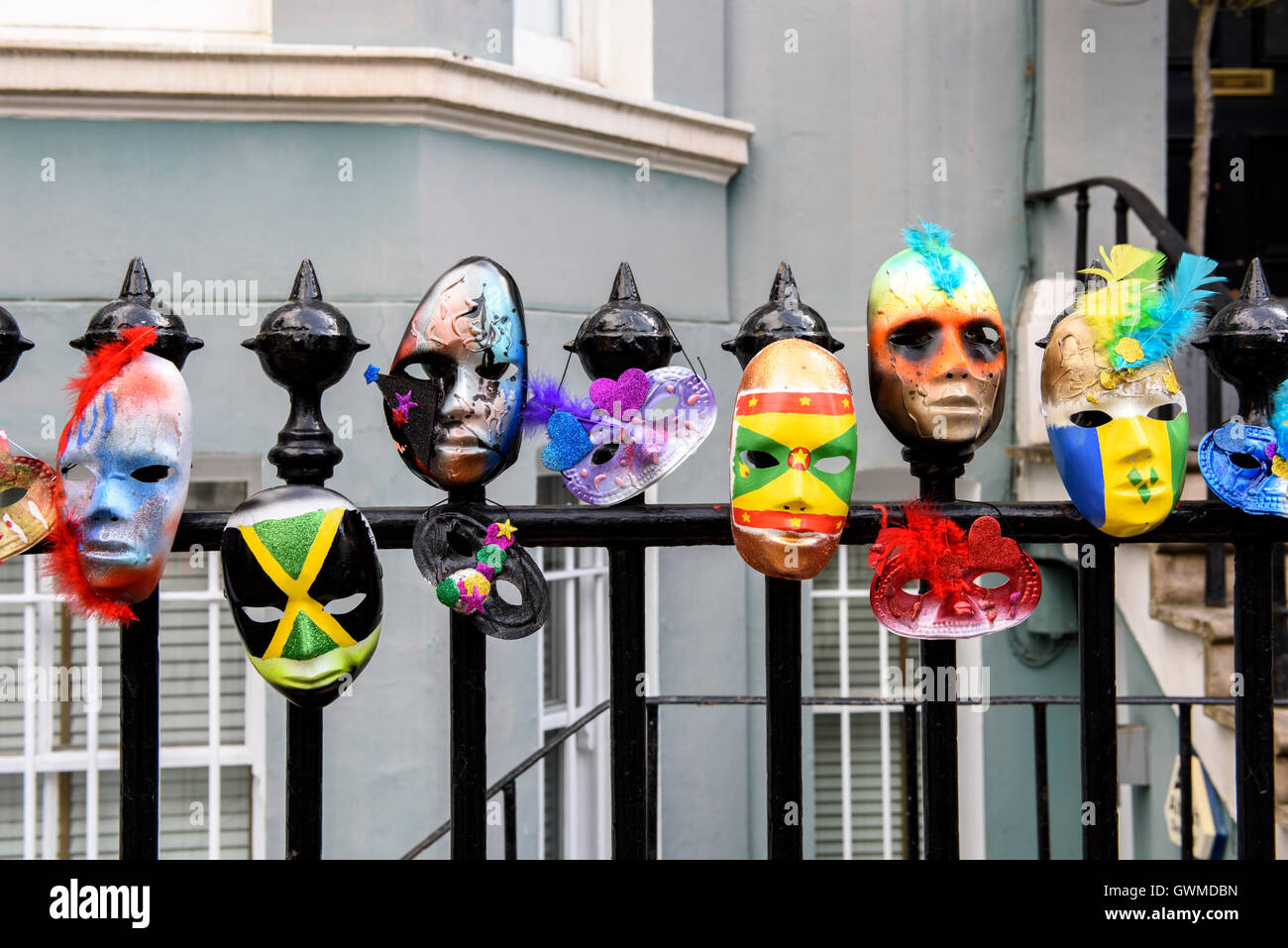 Masks on fence hires stock photography and images Alamy