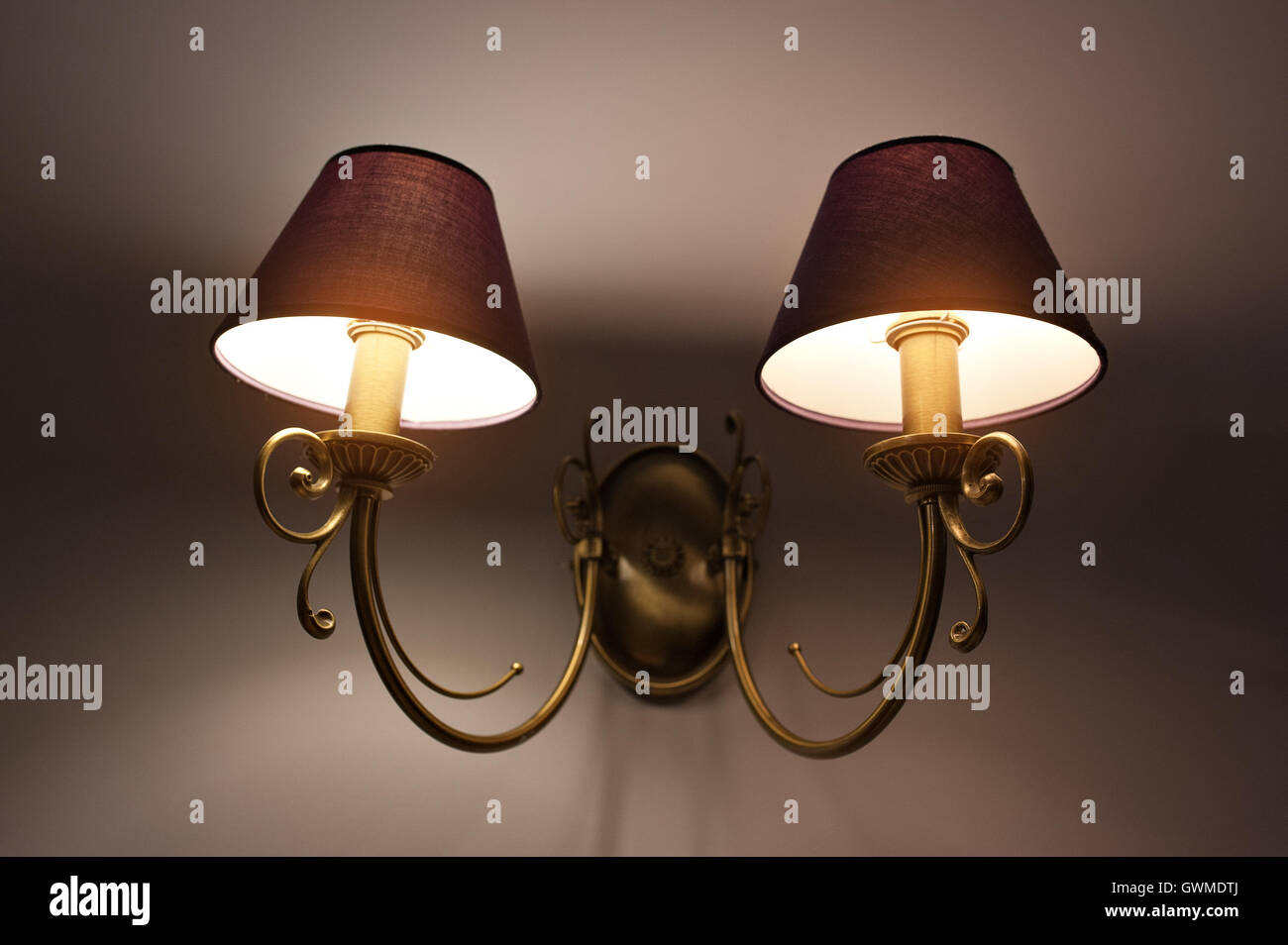 Two Wall lamps with yellow shade from canvas Stock Photo