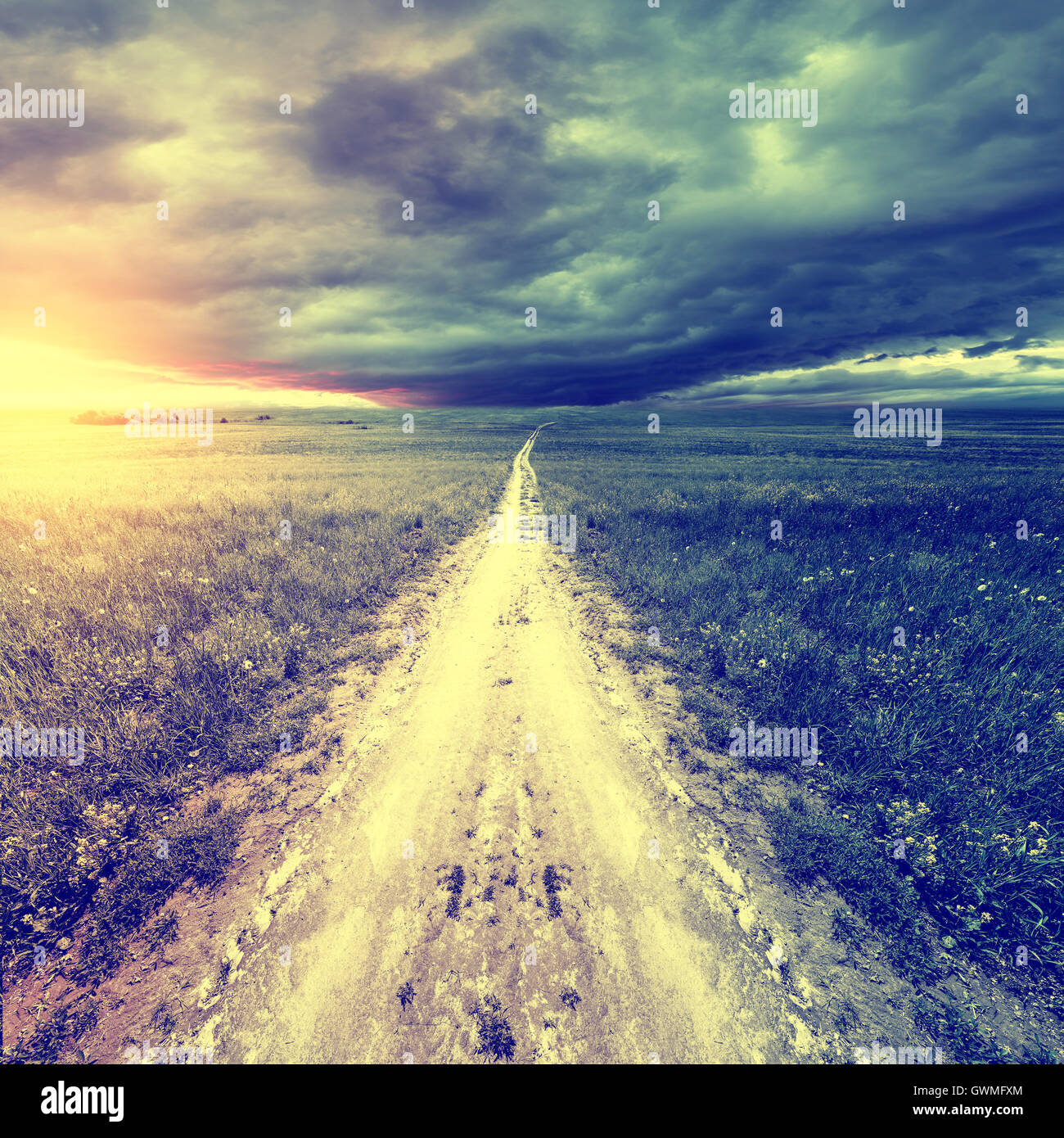 Dark stormy clouds above the road Stock Photo - Alamy