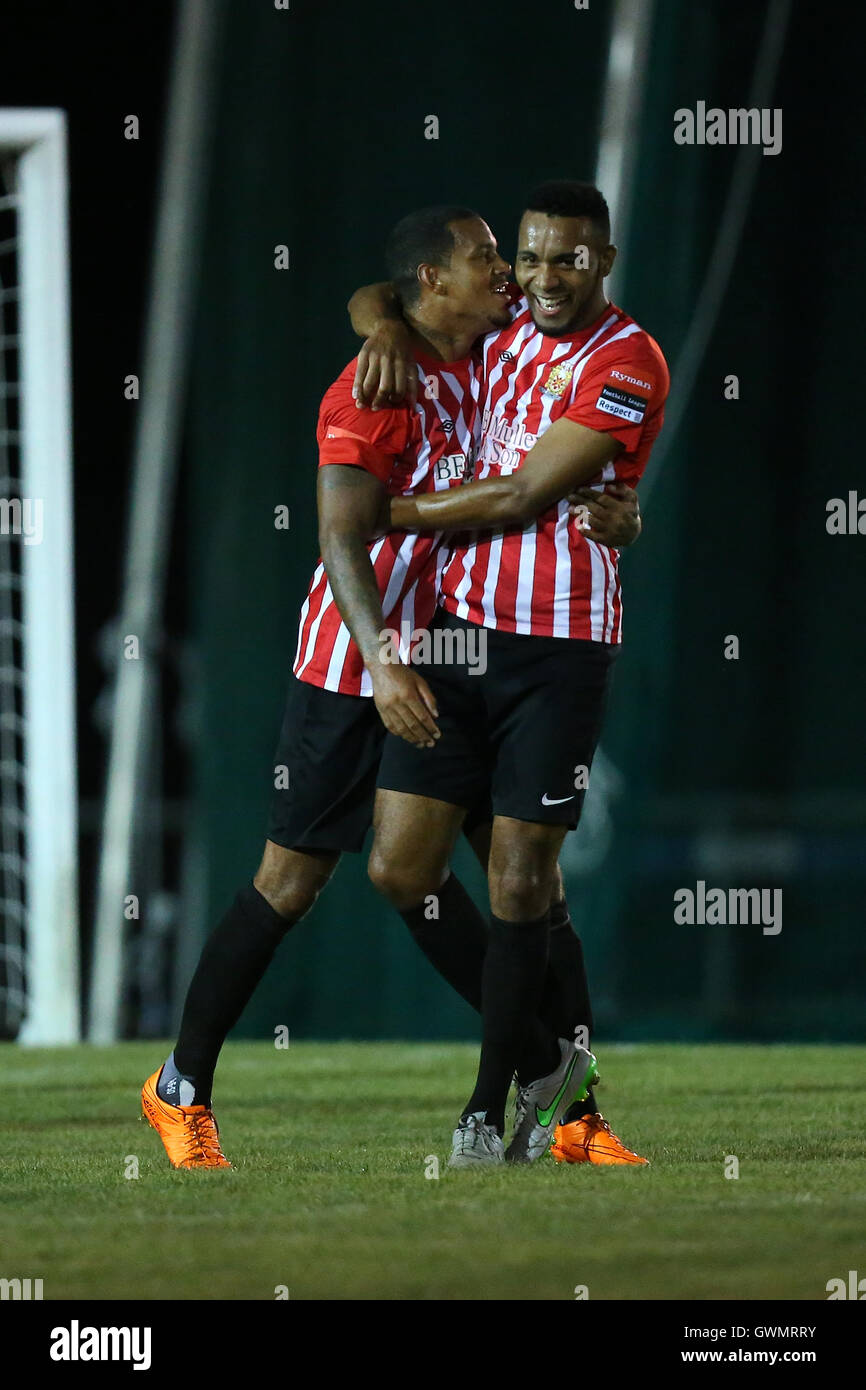Leon McKenzie of Hornchurch (L) scores the first goal for his team and