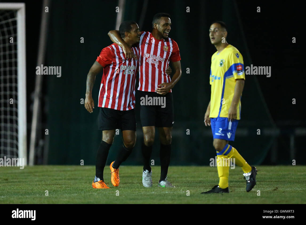Leon McKenzie of Hornchurch (L) scores the first goal for his team and