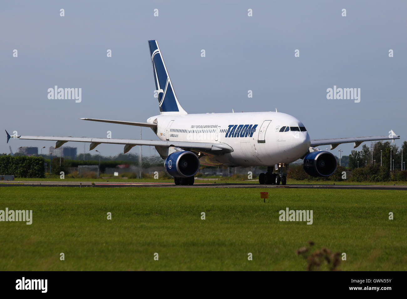 Tarom Airbus A310 taxis for departure at Amsterdam Schipol airport. Stock Photo