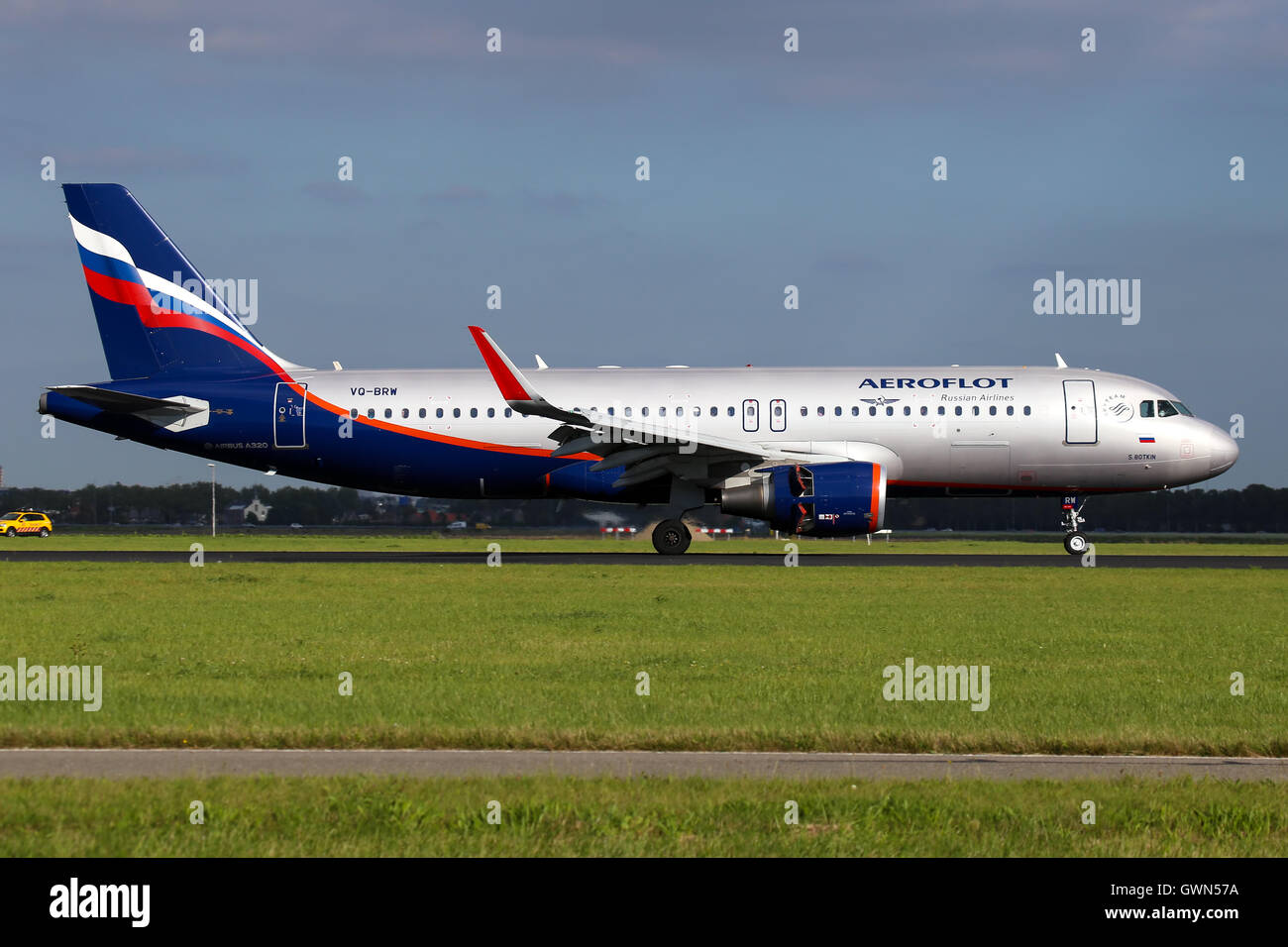 Aeroflot A320 touches down on runway 18R at Amsterdam Schipol airport. Stock Photo