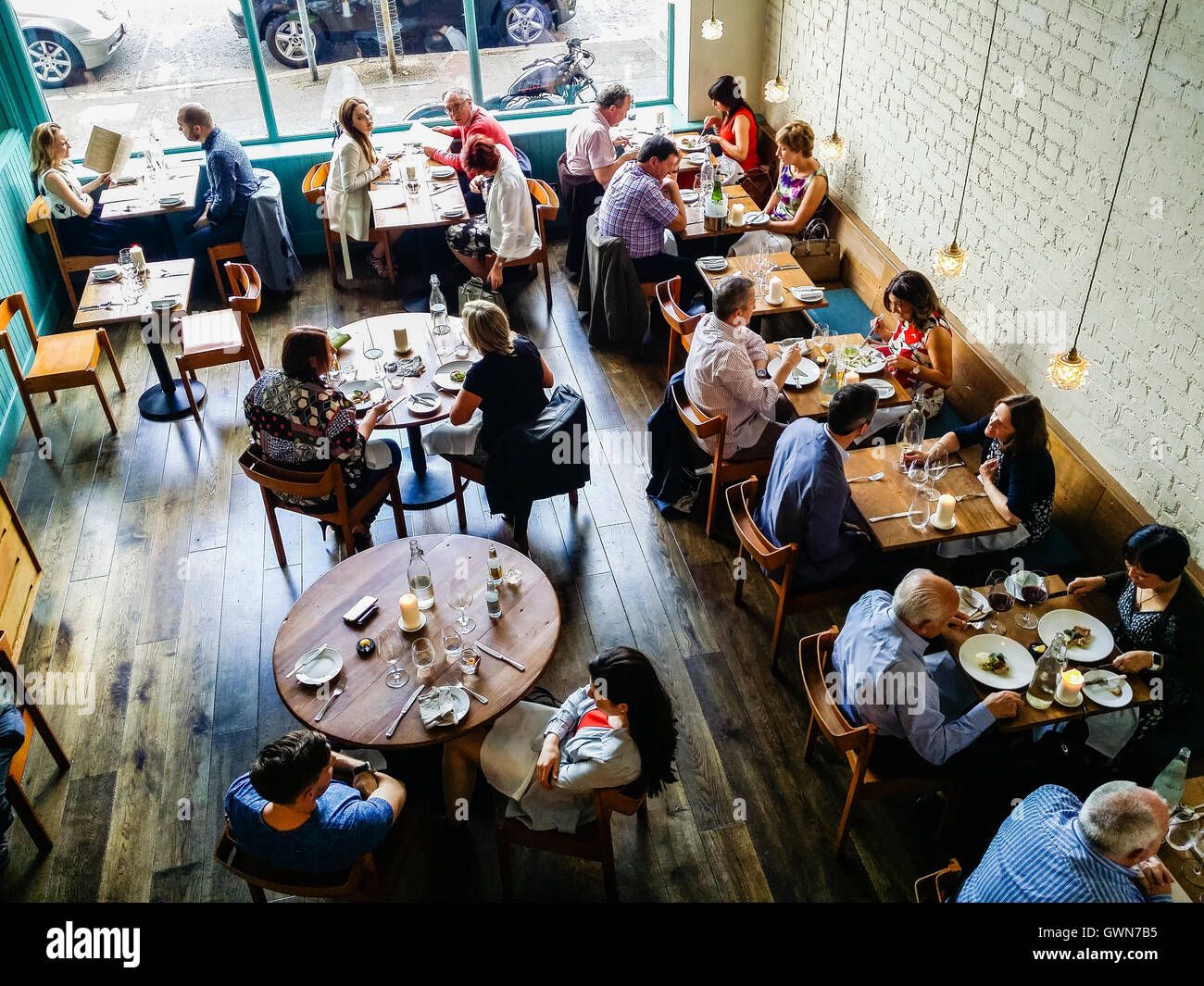 Diners inside the Michelin Starred restaurant Ox, Belfast Stock Photo